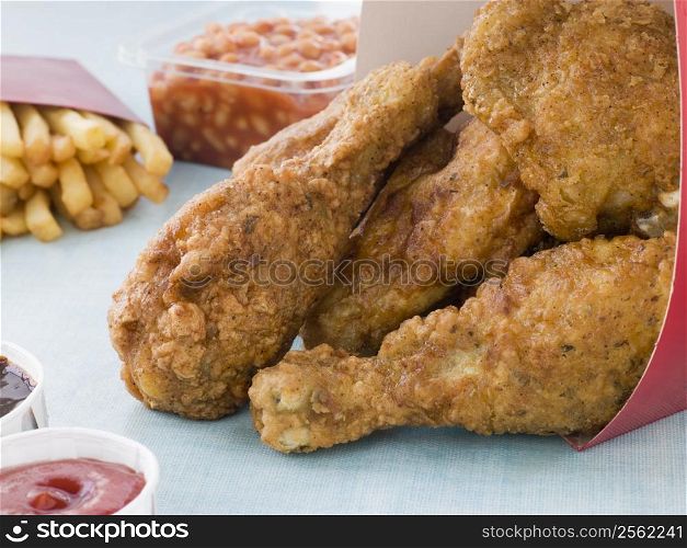 Southern Fried Chicken In A Box With Fries, Baked Beans, Coleslaw And Sauces
