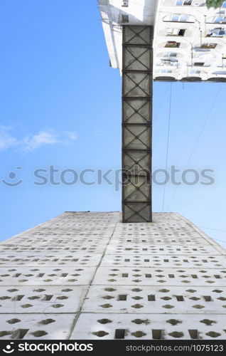 Soviet architecture. Blocks of flats connected with an iron bridge.