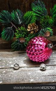 Soviet retro Christmas decorations. Old-fashioned russian glass Christmas decorations and fir branch