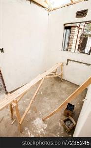 Soweto, South Africa - September 10, 2011: Interior rooms while building and painting a small low cost house in Soweto
