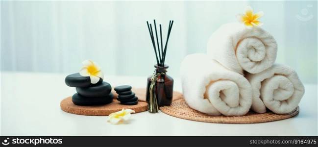 Spa accessory composition set in day spa hotel , beauty wellness center . Spa product are placed in luxury spa resort room , ready for massage therapy from professional service .. Spa accessory composition set in day spa hotel , beauty wellness center