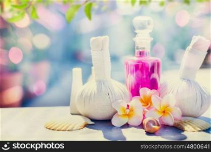 Spa and massage setting with frangipany flowers for Healthy treatments at spring or summer nature background