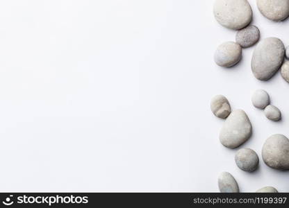 Spa background with grey stones, flat lay, copy space. Spa background with grey stones, flat lay