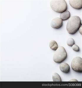 Spa background with grey stones, flat lay, copy space. Spa background with grey stones, flat lay