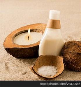 Spa coconut body products lotion on sand