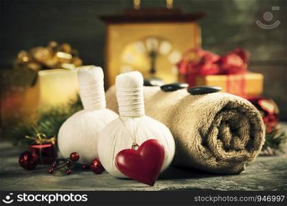 Spa composition with Christmas decoration. Holiday SPA treatment. Holiday and relaxation concept