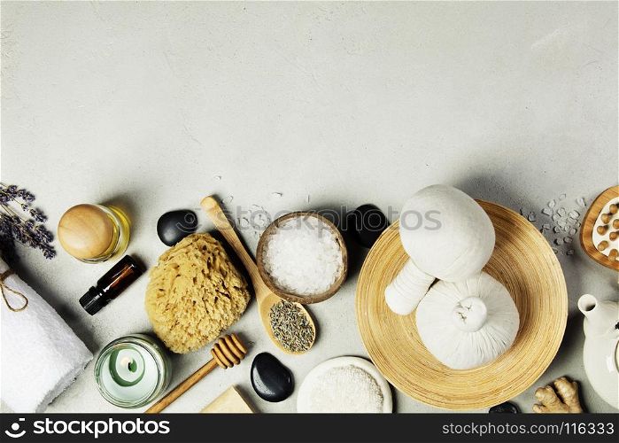 Spa Concept. Top view of beautiful Spa Products on concrete background