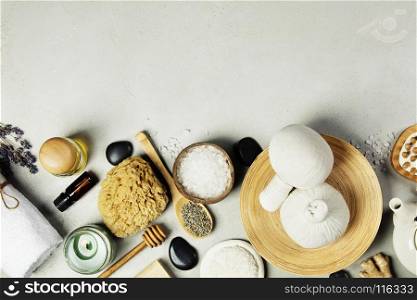 Spa Concept. Top view of beautiful Spa Products on concrete background