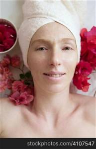 Spa flowers relaxing massage theraphy. Female thirty to fourty years