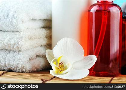 spa oils and orchid close up
