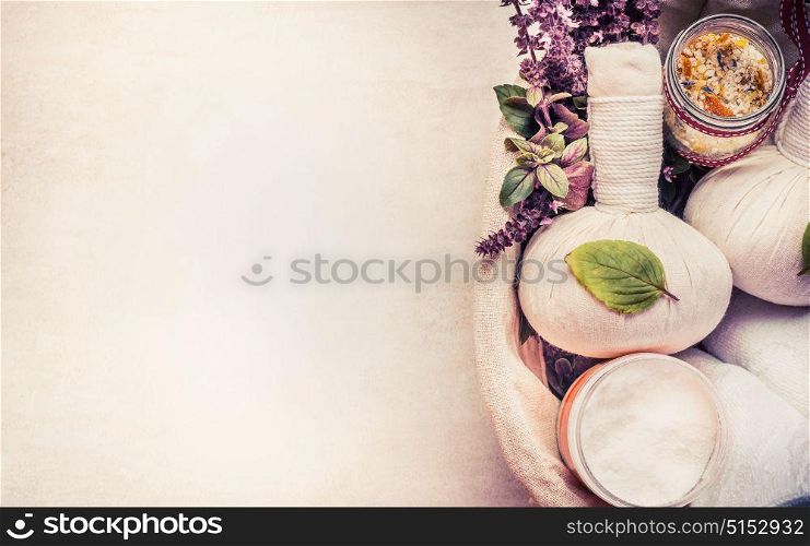 Spa or wellness background with herbal equipment for massage and relaxing treatment, top view