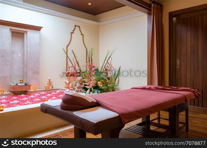 Spa room with bed for treatment
