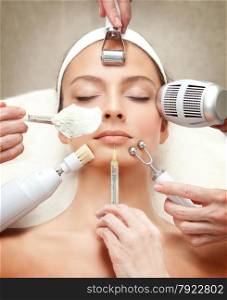 Spa Salon: Young Beautiful Woman Having Different Facial Treatment