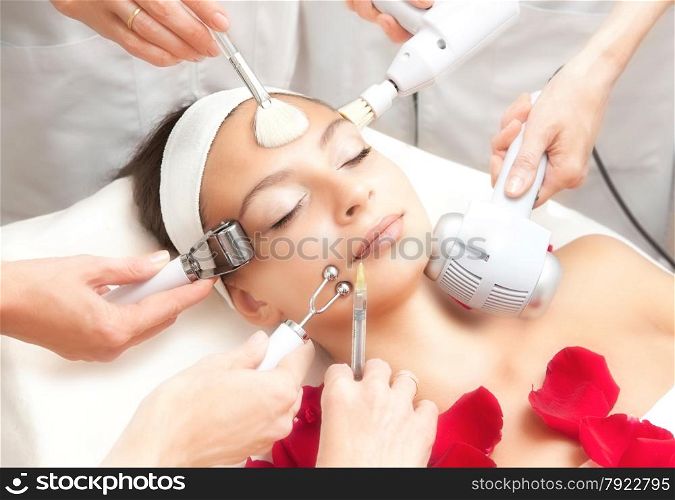 Spa Salon: Young Beautiful Woman Having Various Facial Treatment