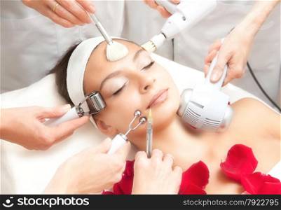 Spa Salon: Young Beautiful Woman Having Various Facial Treatment