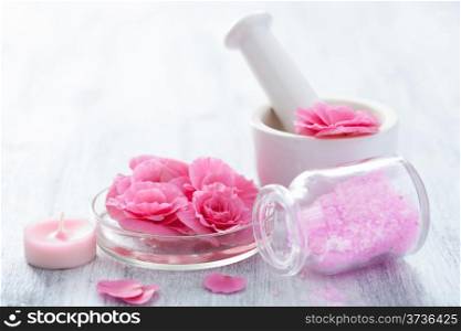 spa set with begonia flowers mortar and salt