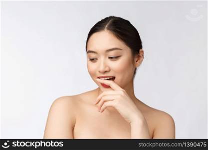 Spa skincare beauty Asian woman drying hair after shower treatment. Beautiful multiracial young girl touching soft skin.. Spa skincare beauty Asian woman drying hair after shower treatment. Beautiful multiracial young girl touching soft skin