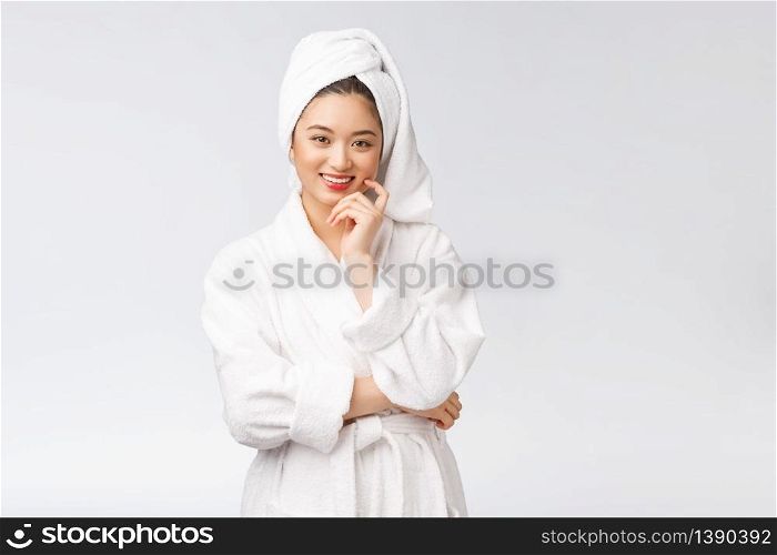 Spa skincare beauty Asian woman drying hair with towel on head after shower treatment. Beautiful multiracial young girl touching soft skin.. Spa skincare beauty Asian woman drying hair with towel on head after shower treatment. Beautiful multiracial young girl touching soft skin