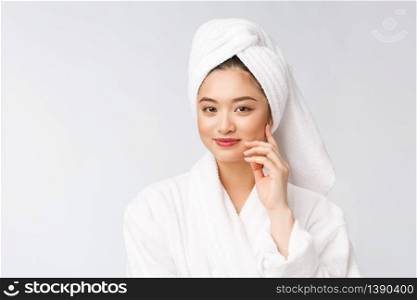Spa skincare beauty Asian woman drying hair with towel on head after shower treatment. Beautiful multiracial young girl touching soft skin. Spa skincare beauty Asian woman drying hair with towel on head after shower treatment. Beautiful multiracial young girl touching soft skin.