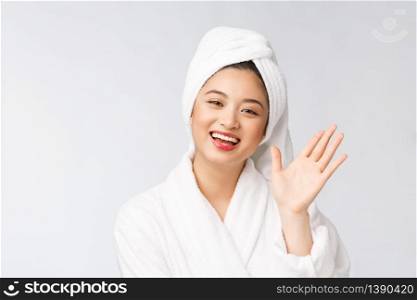 Spa skincare beauty Asian woman drying hair with towel on head after shower treatment. Beautiful multiracial young girl touching soft skin.. Spa skincare beauty Asian woman drying hair with towel on head after shower treatment. Beautiful multiracial young girl touching soft skin