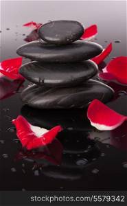 Spa stone and flower petal still life. Healthcare concept.