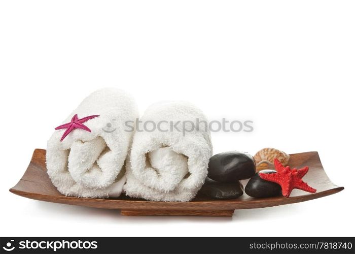 spa stones and towels isolated