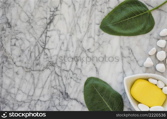 spa stones soap near leaves