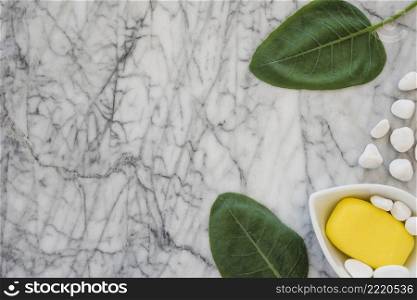 spa stones soap near leaves