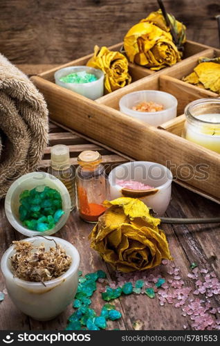 Spa treatments on the background of yellow rose buds