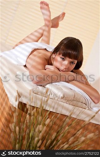 Spa - Young woman at wellness therapy enjoy massage