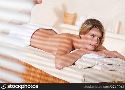Spa - Young woman at wellness therapy treatment relaxing
