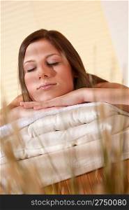 Spa - Young woman at wellness therapy treatment relaxing