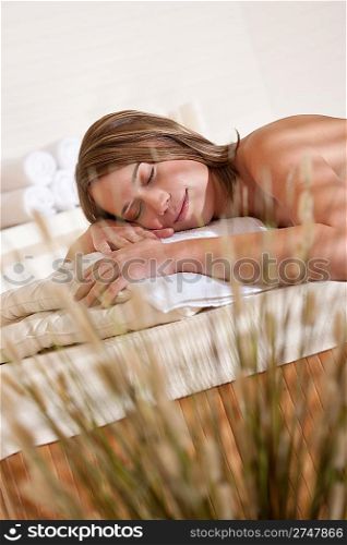 Spa - Young woman relax at wellness massage treatment therapy
