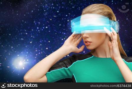 space, future technology and people concept - beautiful futuristic woman in virtual reality glasses over stars background. woman in virtual reality glasses over space
