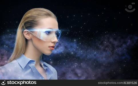 space, future technology and people concept - beautiful futuristic woman in virtual reality glasses over planet and stars background. woman in virtual reality glasses over space