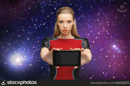 space, future technology and people concept - beautiful futuristic woman with tablet pc computer over planet and stars background. futuristic woman with tablet pc over space