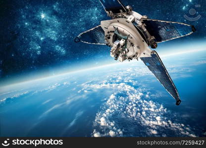 Space satellite orbiting the earth. Elements of this image furnished by NASA.