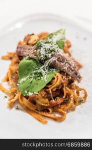 Spaghetti a la puttanesca with anchovy