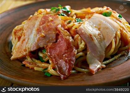 Spaghetti allamatriciana with bacon.traditional Italian pasta sauce