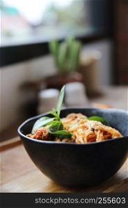 spaghetti and meatballs on wood background italian food