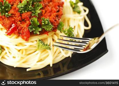 Spaghetti bolognese and fork