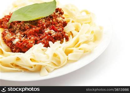 Spaghetti bolognese on white plate