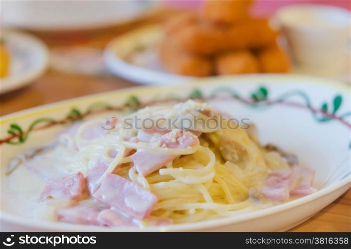 Spaghetti Carbonara. Spaghetti Carbonara with bacon and cheese on dish
