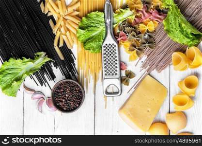 spaghetti for cooking pasta. Set raw spaghetti and macaroni on the kitchen table
