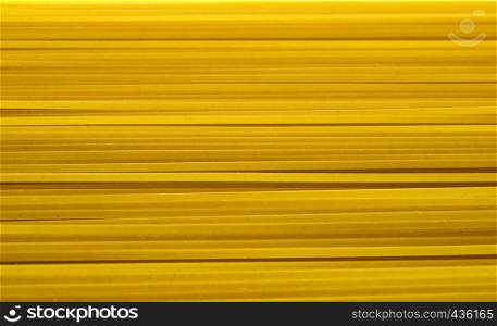 Spaghetti pasta - yellow abstract background