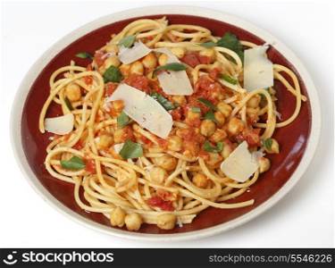 Spaghetti with a chickpea, tomato and chilli flakes sauce, garnished with fresh torn basil leaves and flakes of parmesan. This is a traditional Italian dish, which comes in many variations, with or without tomate or with chickpeas wholly or partly crushed into the sauce. It is called spaghetti alla ceci