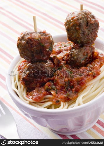 Spaghetti with Meatball Sticks and Spicy Tomato Sauce