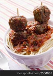 Spaghetti with Meatball Sticks and Spicy Tomato Sauce