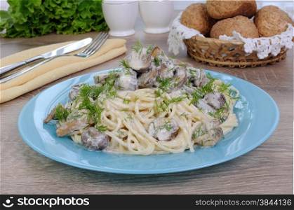 Spaghetti with mushroom cream sauce and dill. Dish for Lent