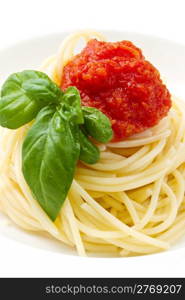 spaghetti with tomato sauce and basil